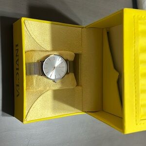 Silver invicta woman’s watch